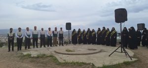 اهتزاز پرچم خورشید/ نام امام رضا(ع) بر بلندای ملایر درخشید